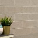 Urbano warm concrete ceramic gray subway tile 4x12 glossy  NURBWARCON4X12 room shot table view 2