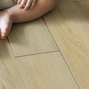 Smithcliffs - Glenbury Oak 7"x48" Waterproof Hybrid Rigid Core Flooring - MSI Collection baby on floor view 2