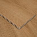 Close-up of a wooden floor panel with a visible grain pattern