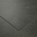 Close-up of dark gray tiles with a geometric pattern