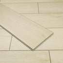 Close-up of wooden flooring with a herringbone pattern