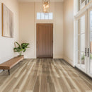 Modern interior hallway with wooden flooring, door, and large windows.
