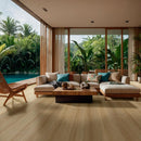 Modern living room with a view of a pool and tropical garden