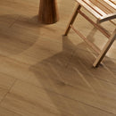 Wooden floor with a chair casting a shadow