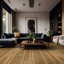 Modern living room with a gray sofa, wooden coffee table, and decorative plants.