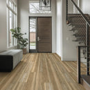 Modern interior with wooden floor, glass door, and staircase