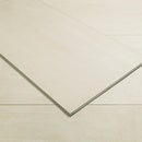 Close-up of a beige envelope with a textured surface