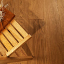 Wooden chair and basket on a wooden floor