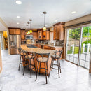 bianco carrara marble tile 12x24 polished installed to a kitchen floor