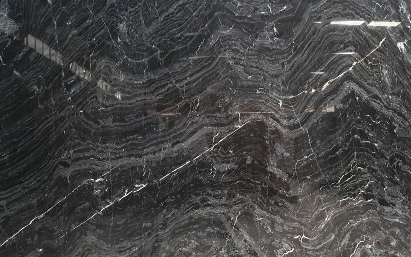 black wave marble slabs polished product shot wide view