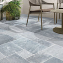 Bluestone Marble Pattern Tumbled Pavers - Full Truckload patio closeup view with wood chairs and plants closeup view