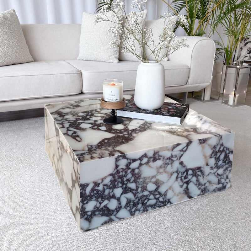 Calacatta Viola Marble Rectangular Prism Block Design Coffee Table (W)24" (L)24" (H)12" installed living room with white couch and white area rug