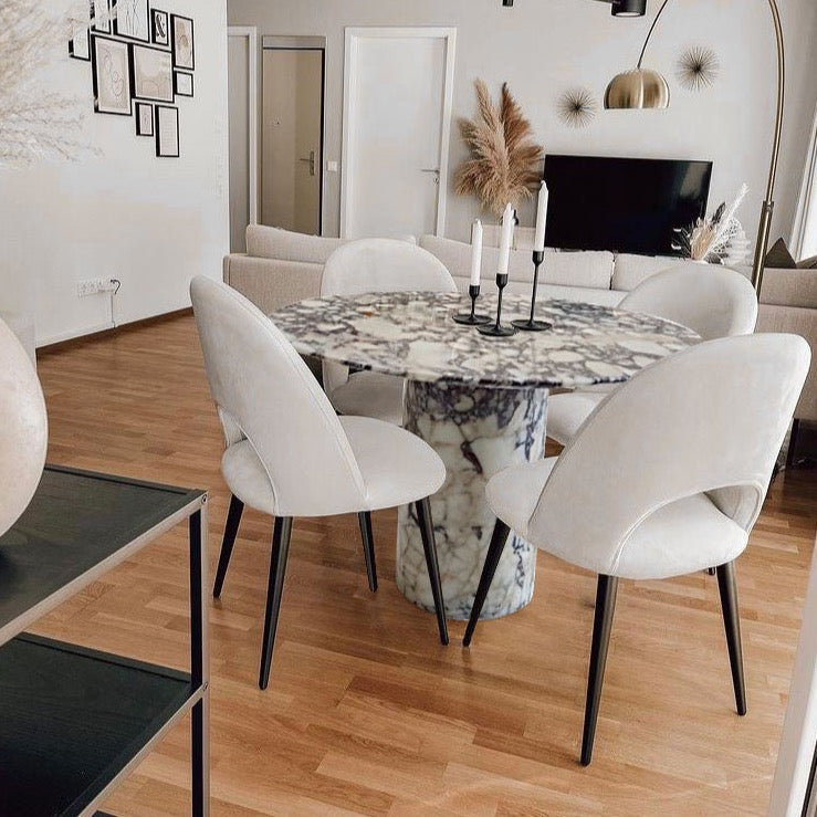 calacatta viola marble round dinner table with marble legs D48 H30 angle modern bright house wood floors and modern lighting