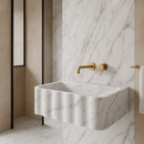 Carrara White Marble Wall-mount Bathroom Sink Fluted Front (W)16" (L)28" (H)10" honed with marble backsplash and gold faucet