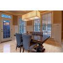 classic light vein cut travertine tile 12x24 polished installed to dining room floor closeup with blue chairs wide view