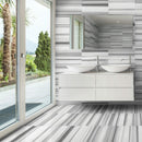 equator white marble floor wall tile 12x24 polished installed on modern bathroom closeup