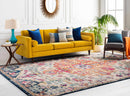 Yellow sofa with colorful pillows in a living room setting.