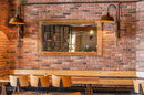 manufactured stone brick veneer granulbrick 50 red handmade B04RE 102285 installed on cafe walls wooden frame mirror antique lights