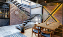 manufactured stone brick veneer granulbrick 50 red handmade B04RE 102285 installed on cafe walls wooden table chairs