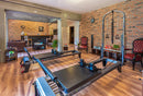 manufactured stone brick veneer granulbrick 50 red handmade B04RE 102285 installed on gyms wall red chairs