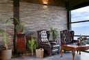 manufactured stone brick veneer maxima chestnut handmade B10CH 317908 installed on living room wall with traditional heater and leather sofas