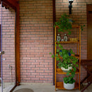 manufactured stone brick veneer slimfix red handmade B05RE 102266 installed on sunroom shelves plants