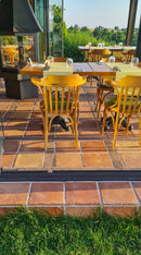 manufactured stone pavers 12x12 Isola 20 cotto dark cotto installed on patio floor