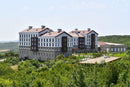 manufactured stone veneer ashlar pattern petra olive handmade S11OL 101241 installed facade hotel building
