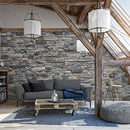 manufactured stone veneer slate look grand canyon ash handmade S12AS 101247 installed on living room wall pallet coffee table gray couch