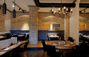 manufactured stone veneer slate look grand canyon pearl ash sand mixed installed on cafe wall