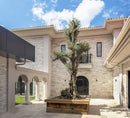 manufactured stone veneer slate look inka pearl white S19PR 317859 installed facade of modern house entrance olive tree