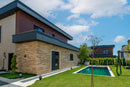 manufactured stone veneer slate look inka sand handmade S19SN 317860 installed facade modern house swimming pool