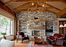 manufactured stone veneer slate look Sierra ash sand mixed handmade installed wall inside house leather seats fireplace antique rug