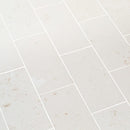 mayra white limestone 24x36 brushed angle view