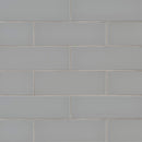 Oyster gray 4x12 glossy glass wall tile SMOT-GL-T-OYGR412 product shot multiple tiles wall view