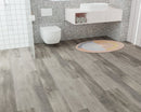 SPC Vinyl Rigid Core 7" Width 60" RL, 8mm Thick, 2mm IXPE Revel Asphalt Bellator Floors - Mazzia Collection Product shoot Wash room view