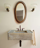 Walnut Travertine Rectangular Wall-mount Bathroom Sink Fluted (W)16" (L)32" (H)10" bathroom bronze color drain pipe and faucet along with sconces and mirror wide view